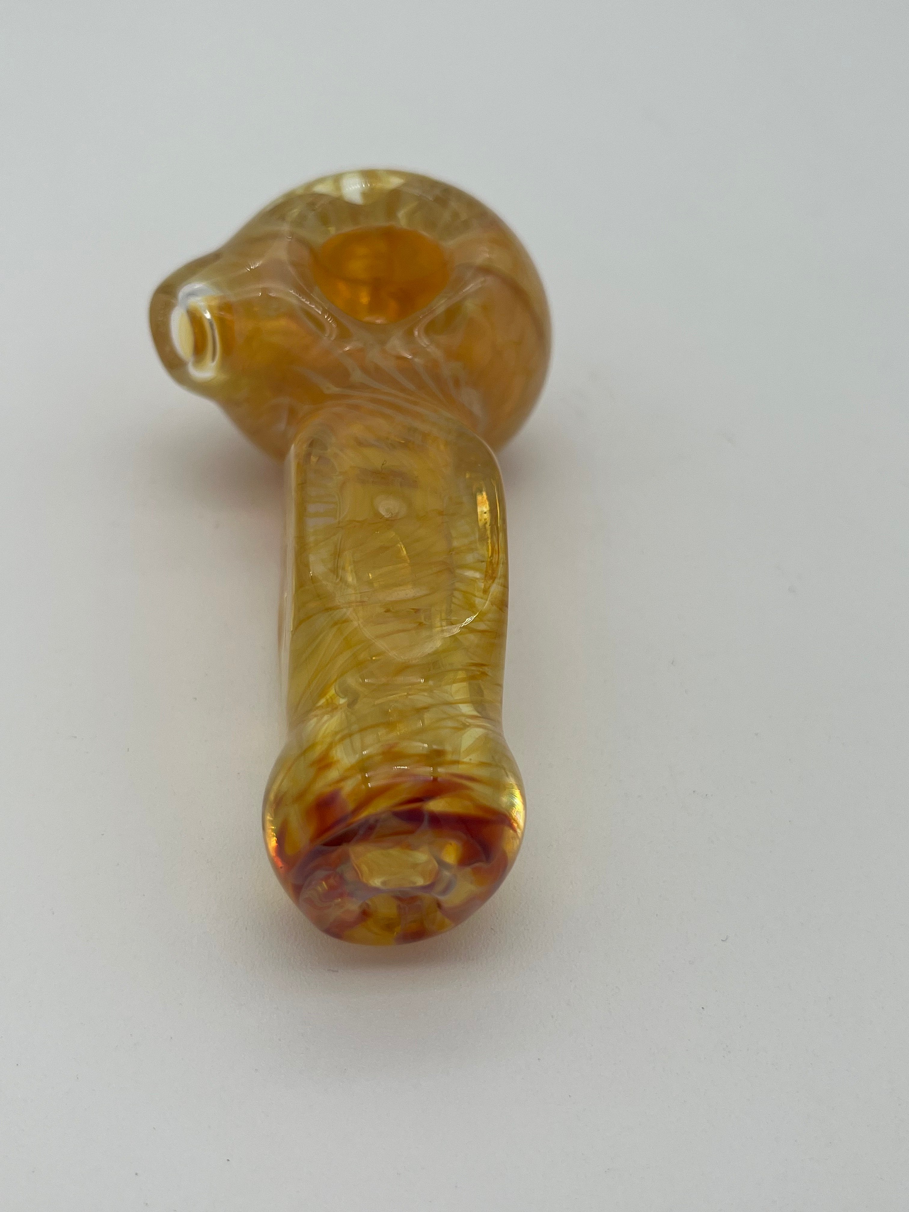 Yellow inside out spiral glass hand pipe made by Nelson Glassworks on a white background